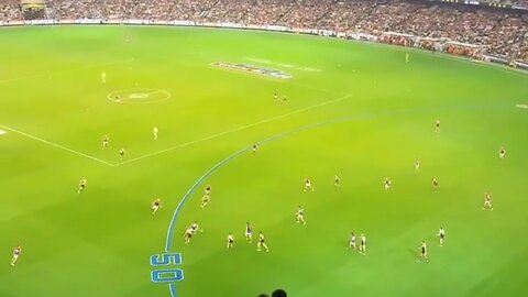 Aussie rules played on a Cricket Stadium in Melbourne, Australia