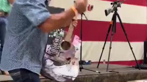 A man spends $4,000 on a Taylor Swift guitar at auction and then destroys it right away,