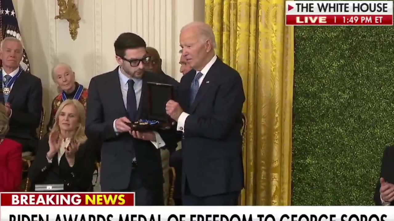 Alexander Soros receives the Presidential Medal of Freedom on behalf of George Soros