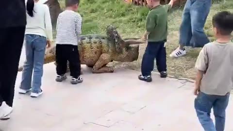 🤖✨ Watch a Robot Dog Play with Kids in a Dinosaur Costume! | FeedMyCuriosity