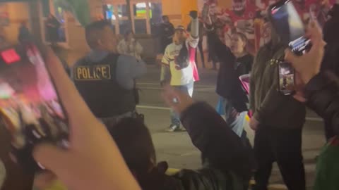 Police Officer Waves Mexican Flag at Kansas City Protest