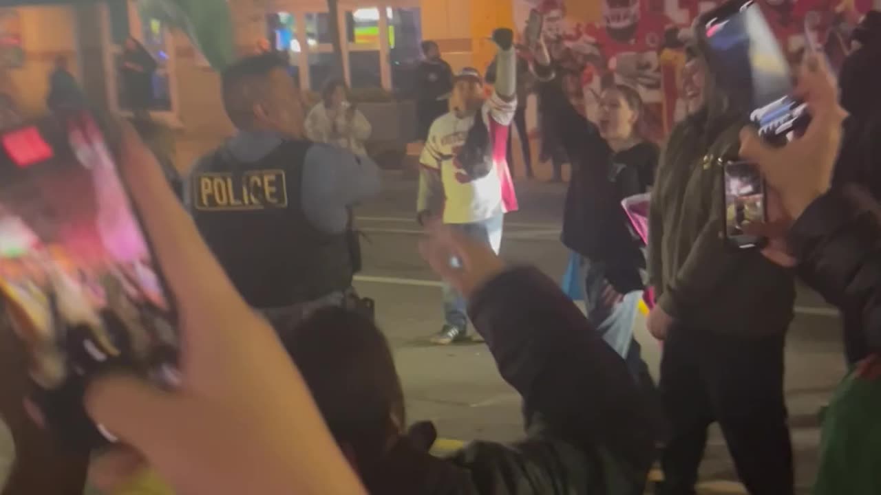 Police Officer Waves Mexican Flag at Kansas City Protest