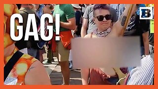 Topless No Kings Protester Waves "Free Luigi, Jail Trump" Sign