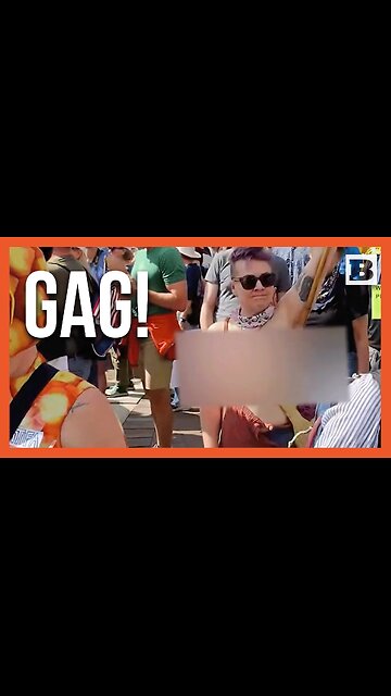 Topless No Kings Protester Waves "Free Luigi, Jail Trump" Sign