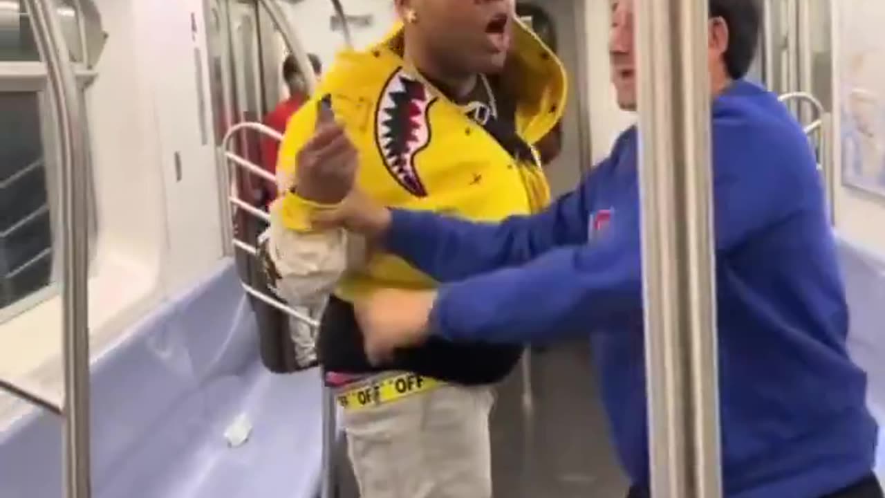 Two individuals on a train engaged in a heated dispute that escalated into a physical altercation,