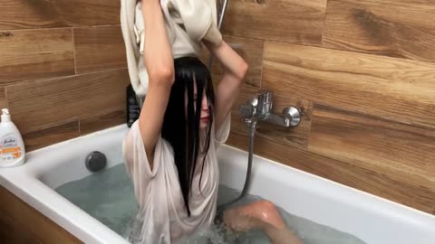 New wetlook with Anastasia and transparent wet clothes in the bath 