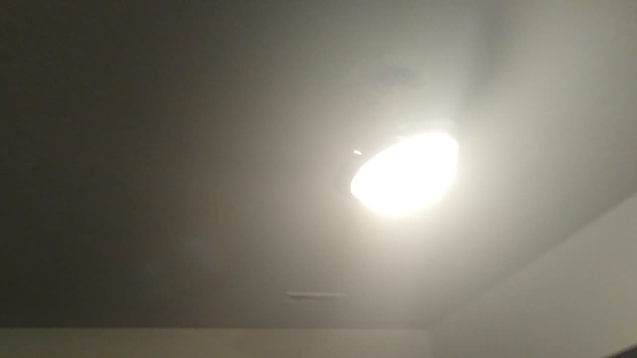 Light fixture hanging by a moment, err, from ceiling after breaking
