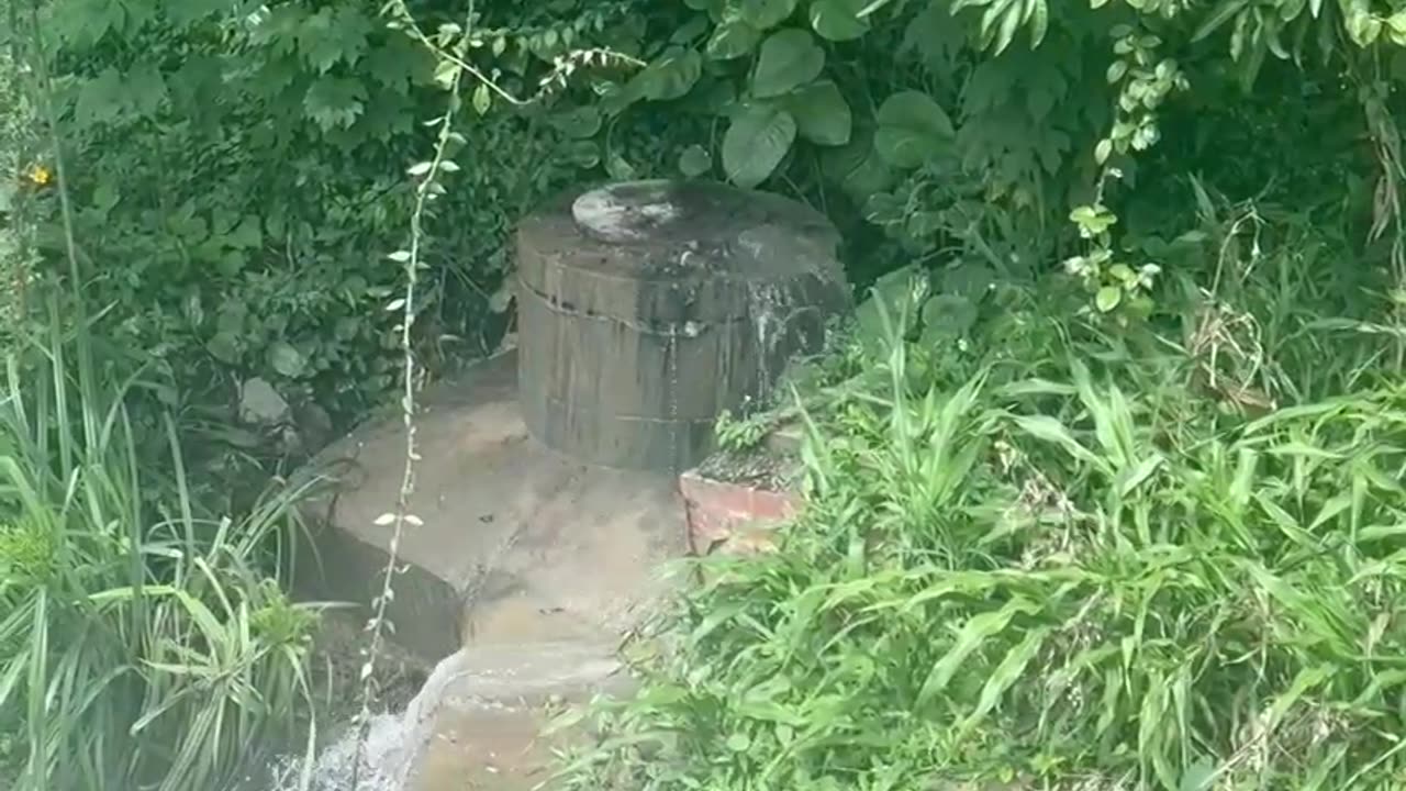 Overflowing manhole near homes in Durban