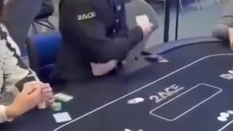 This poker dealer effortlessly deals cards with one hand