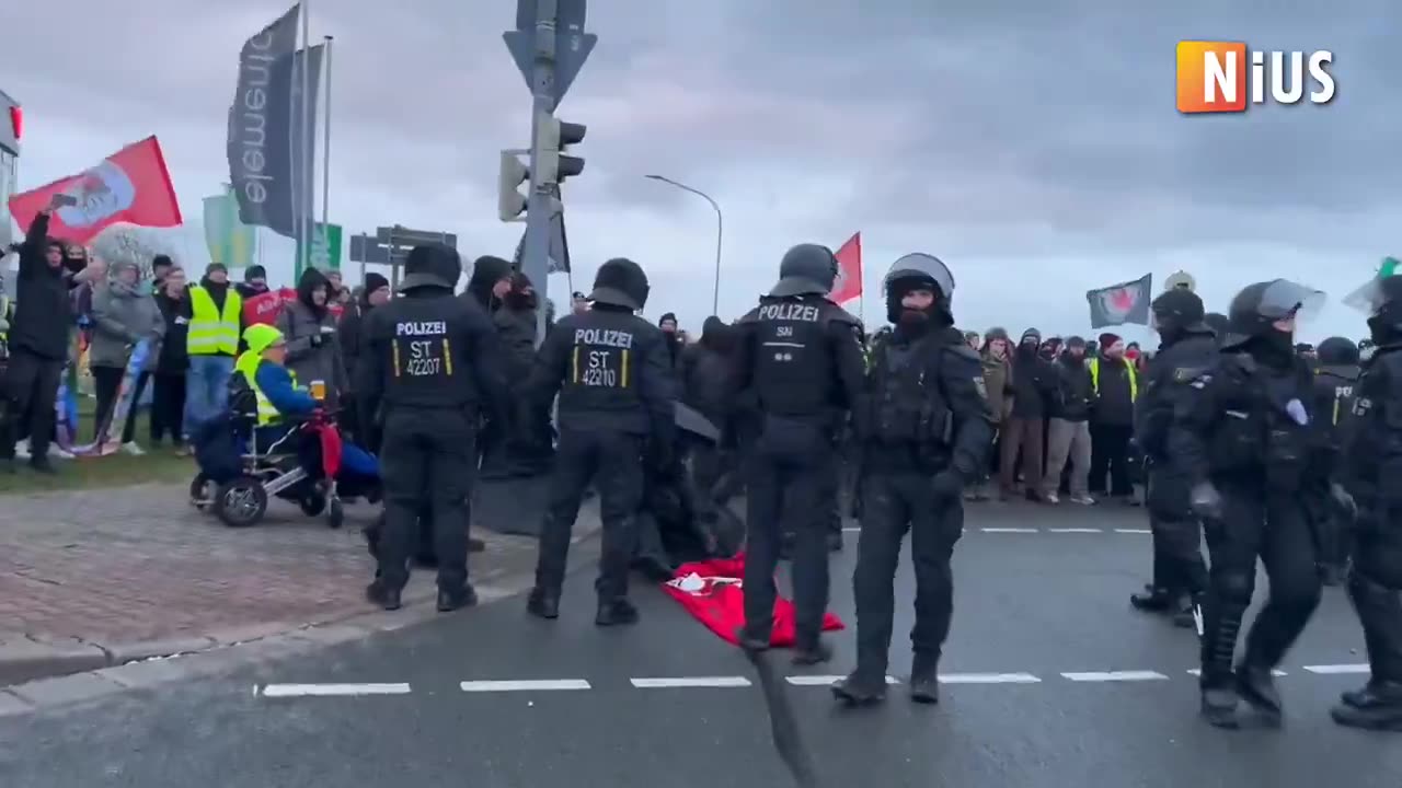 Masked far-left activists from the ANTIFA extremist group march through the