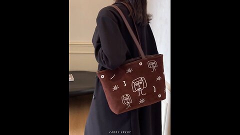 Stylish Suede Tote Bag with Unique Abstract Face Design