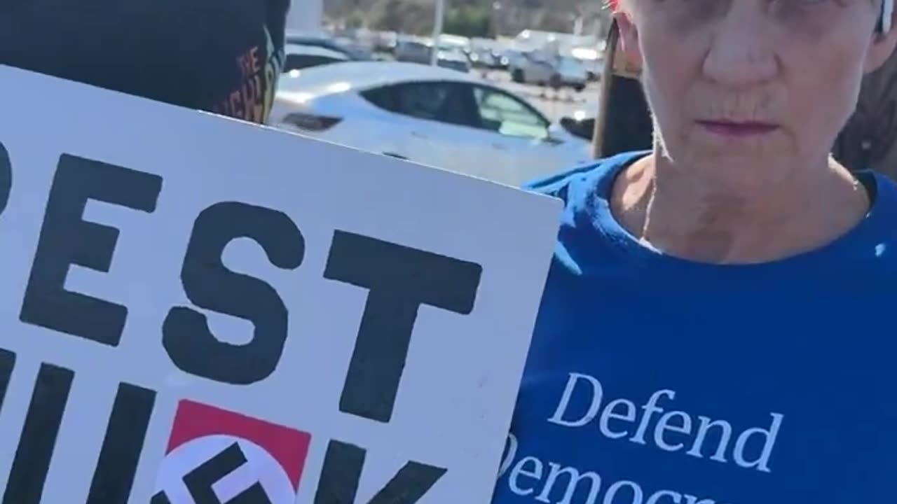 An Elon Musk protestor near Portland, Oregon