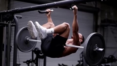 Pull-ups on a crossbar with a barbell