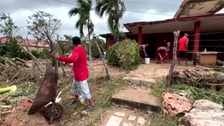 Cubans clear debris from homes after Hurricane Melissa