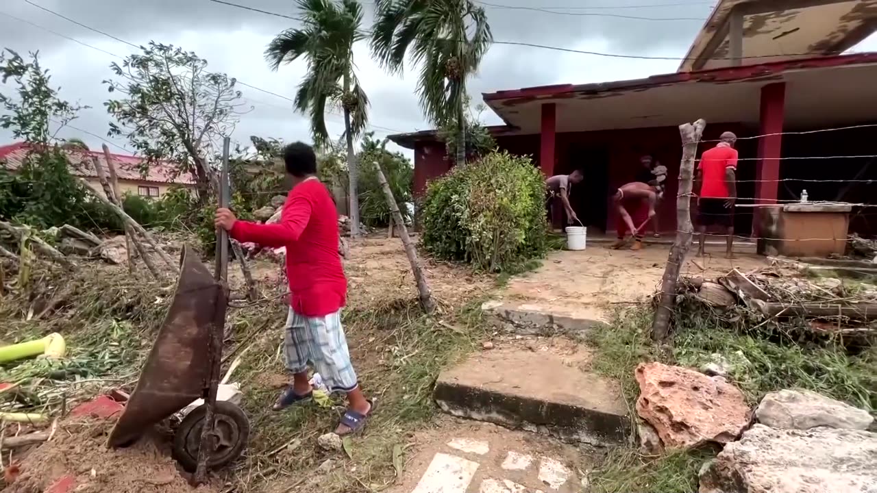 Cubans clear debris from homes after Hurricane Melissa