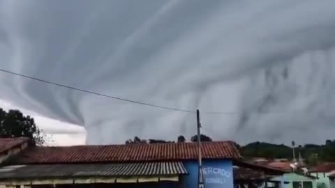 Massive thundercloud engulfs Brazilian towns, creating terrifying visuals.