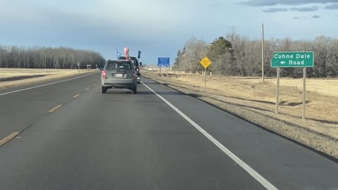 Bill gives a short talk while driving in the Farmer's Convoy, Nisku to Acheson AB, November 22, 2025
