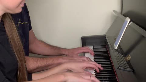 A Cat and Two Pianists