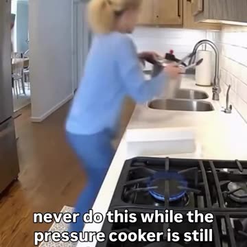 never do this while the pressure cooker is still under pressure.