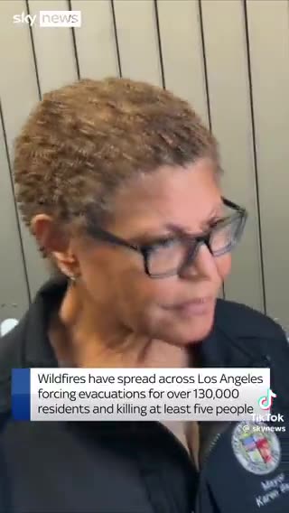 I mayor Karen Bass completely silent in front of reporters.. the look of fear and guilt is visible.