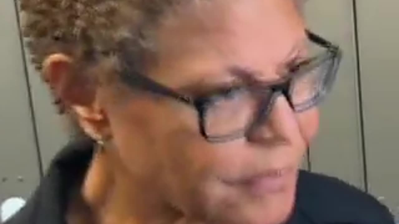 I mayor Karen Bass completely silent in front of reporters.. the look of fear and guilt is visible.