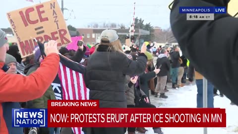 Protesters surround ICE agents in Minneapolis on day after shooting