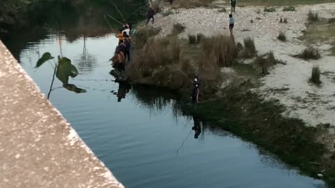 "Traditional Riverbank Fishing | Peaceful Fishing Scene with Friends & Family"