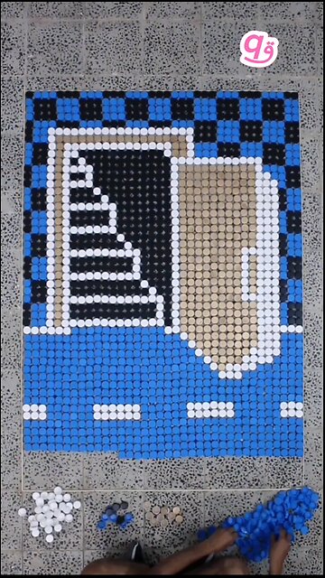 We built a #3D door illusion using 1,872 bottle caps! 🚪✨