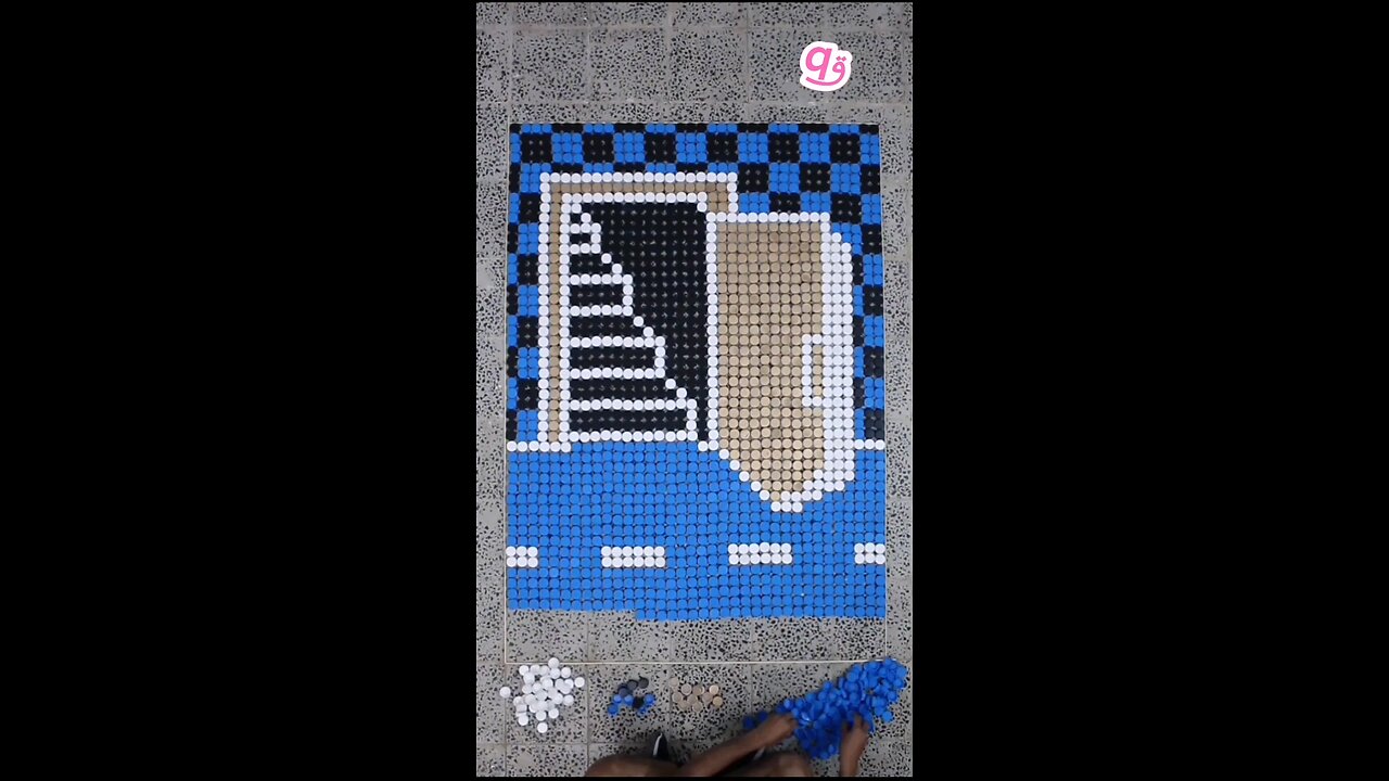We built a #3D door illusion using 1,872 bottle caps! 🚪✨