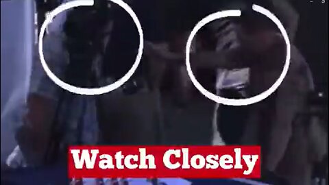 Another video of that SAME Charlie Kirk Assassin suspect being HANDED something by Charlie's body