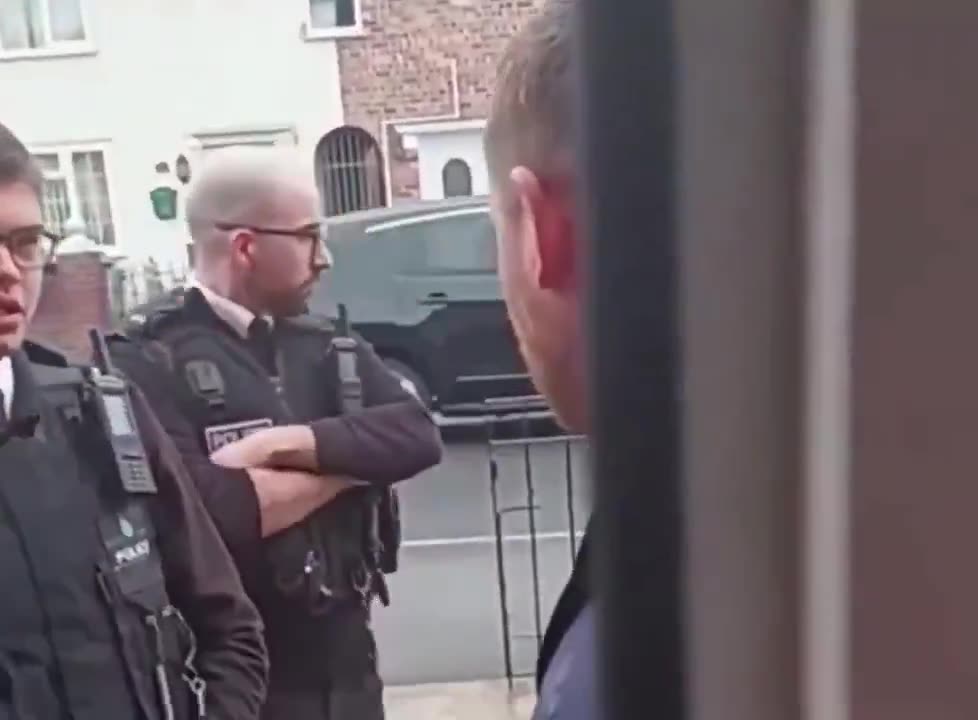 Four British officers go to a mans home to arrest him for his tweets