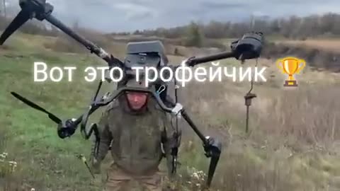 🚁🏅 Ukraine Russia War | Russian Soldier Displays Captured UAF Heavy-Bomber Drone | RCF