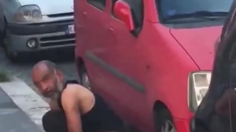 Illegal migrant pooping in public in Italy