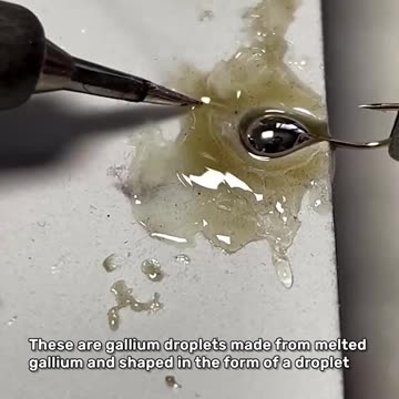 Beautiful gallium droplets attached to a hook