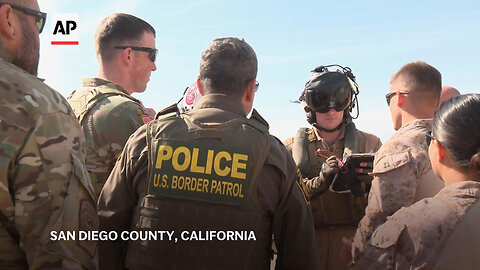 Marines use Osprey aircraft and concertina wire to fortify the border wall