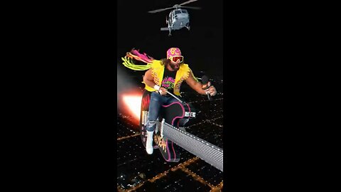 Macho Man Randy Savage Is Surfing on a Guitar