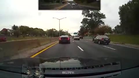 swimming through traffic with a biker