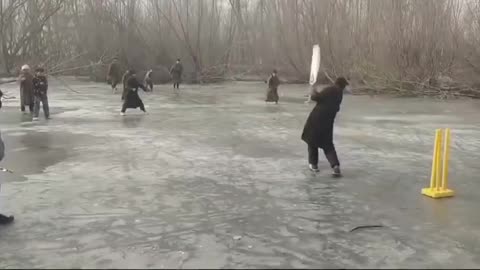 Braving the Cold Kashmiri kids Play Cricket on Ice Covered Pond During Chillai Kalan🥶🥶