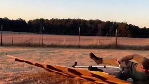 Trying to jump two mean goats with a pogo stick!