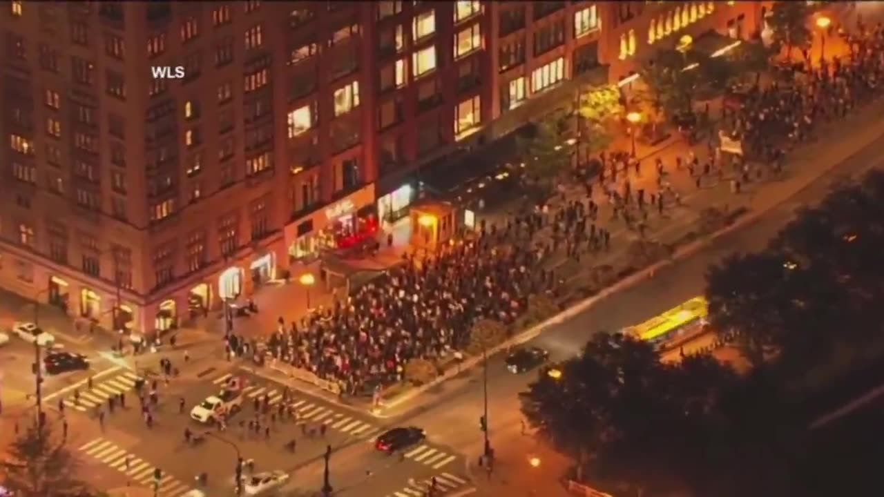 Hundreds of anti-ICE protesters march through downtown Chicago, Illinois.