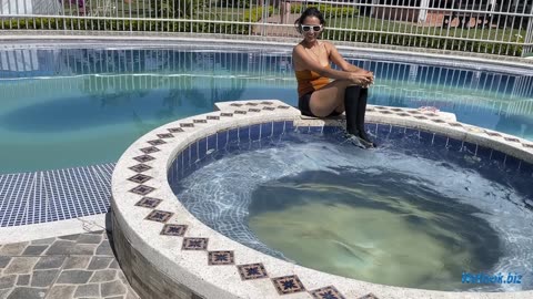 wetlook girl swimming fully dressed