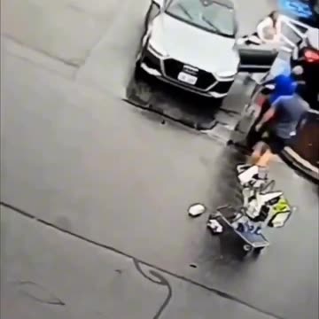 HOLY SSH!T! In a Walmart parking lot a woman gunned her car toward her husband narrowly missing him.