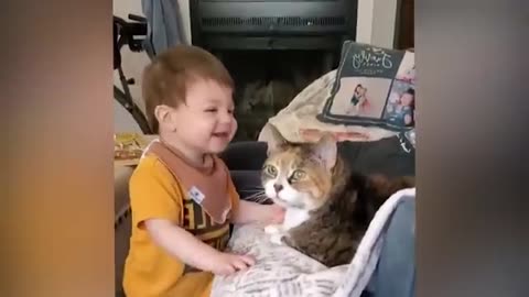 Cute babies play with dogs and cats