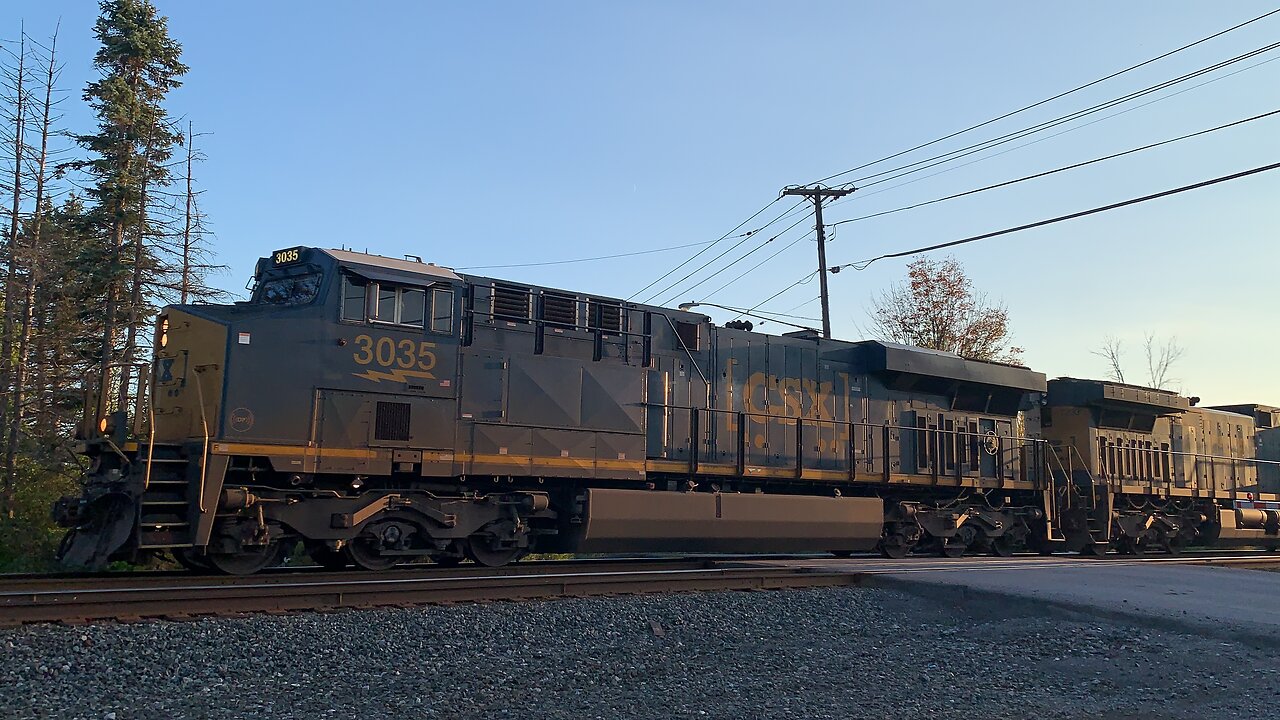 CSX Trains 3035 and 7233 head East in a hurry