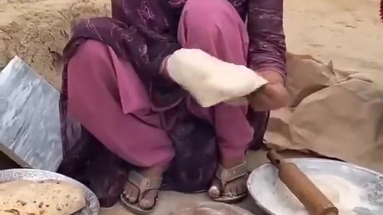 Desi girl making roti village Pakistan