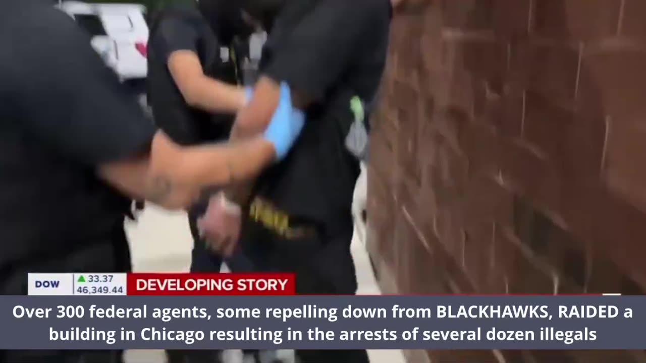 Agents, some repelling down from BLACKHAWKS, RAIDED a building in Chicago