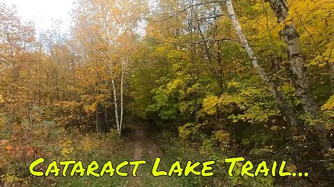 Walking on Cataract Lake Trail in Maplewood State Park in Minnesota