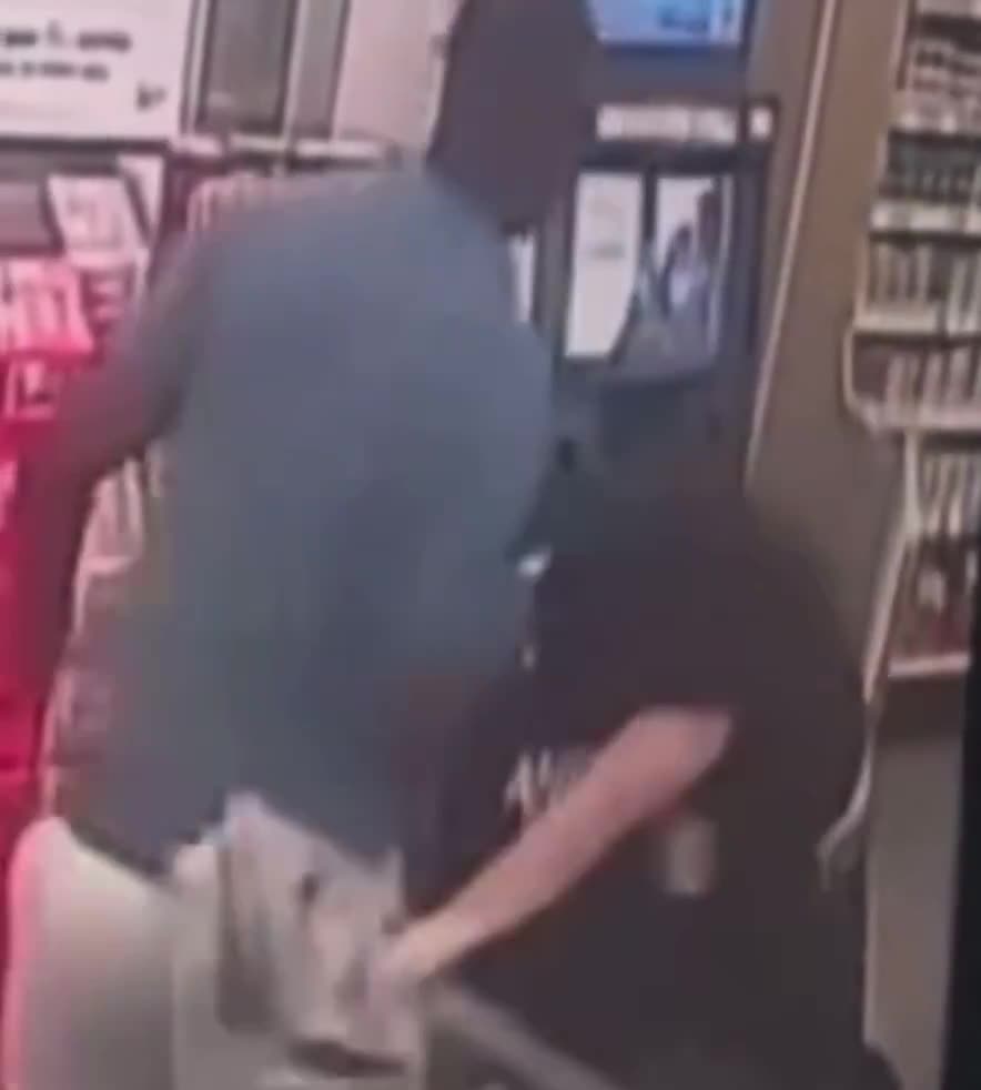 Black attacks White clerk