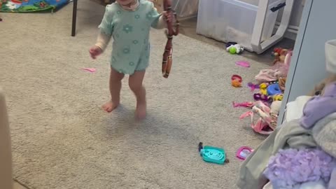 Little Girl Plays With a Big Snake