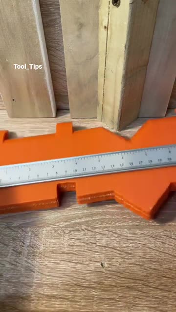 Woodworker Using a Contour Gauge to Trace Shapes onto a Wooden Plank